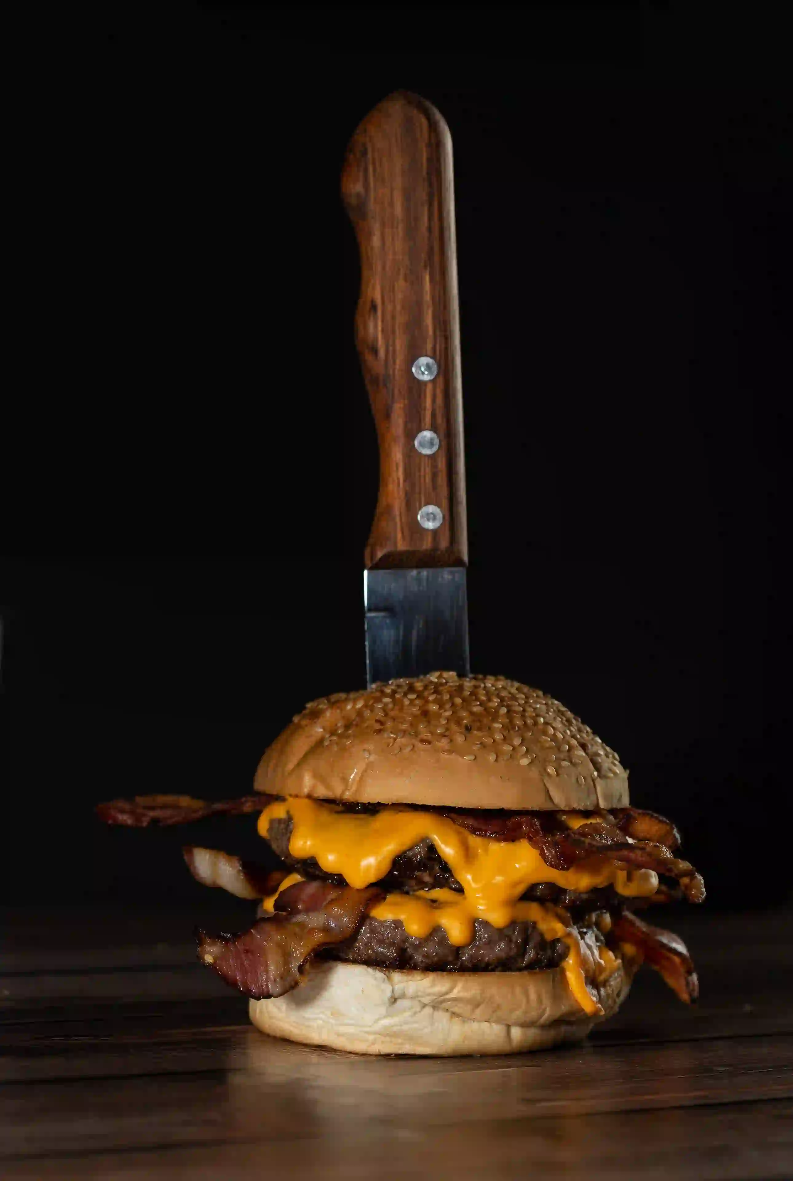 Juicy grilled beef, with cheddar cheese, bacon, served with fries.